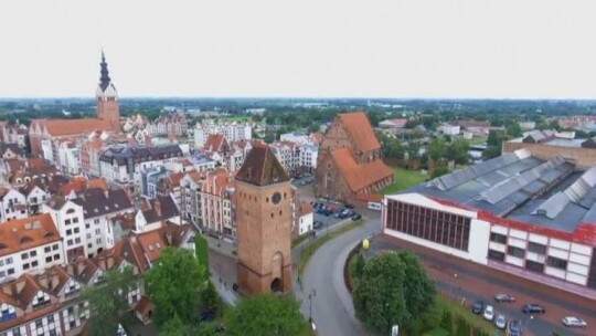 Przewodnicy zapraszają do zwiedzania Bramy Targowej